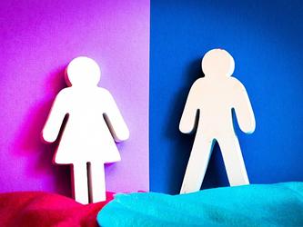 female and male gender signs with a pink and blue background